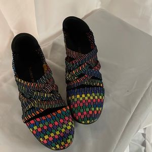 Bernie Mev rainbow closed toe wedge shoes.